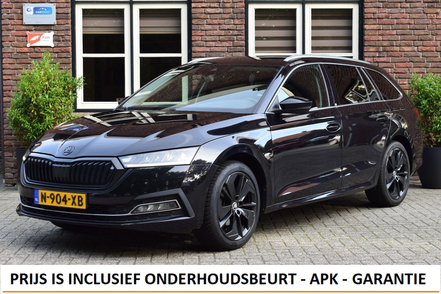 Skoda Octavia Combi - 1.0 e-TSI Business Edition Camera | Keyless | Stoelverwarming - AutoWereld.nl