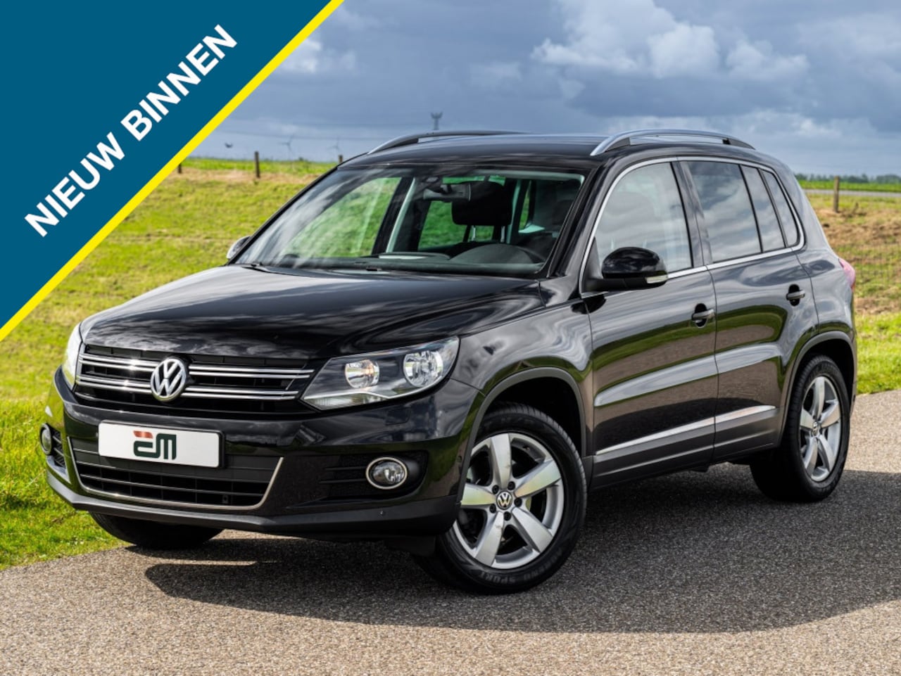 Volkswagen Tiguan - 1.4 TSI Sport&Style Trekhaak Navi PDC Stoelverwarming etc. - AutoWereld.nl