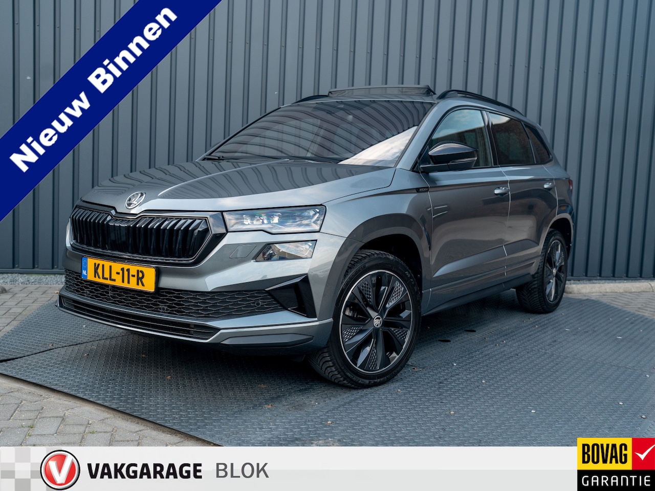 Skoda Karoq - 1.5 TSI ACT Sportline Business | Panodak | Trekhaak wegkl. | Stoel geheugen | Leder | Prij - AutoWereld.nl