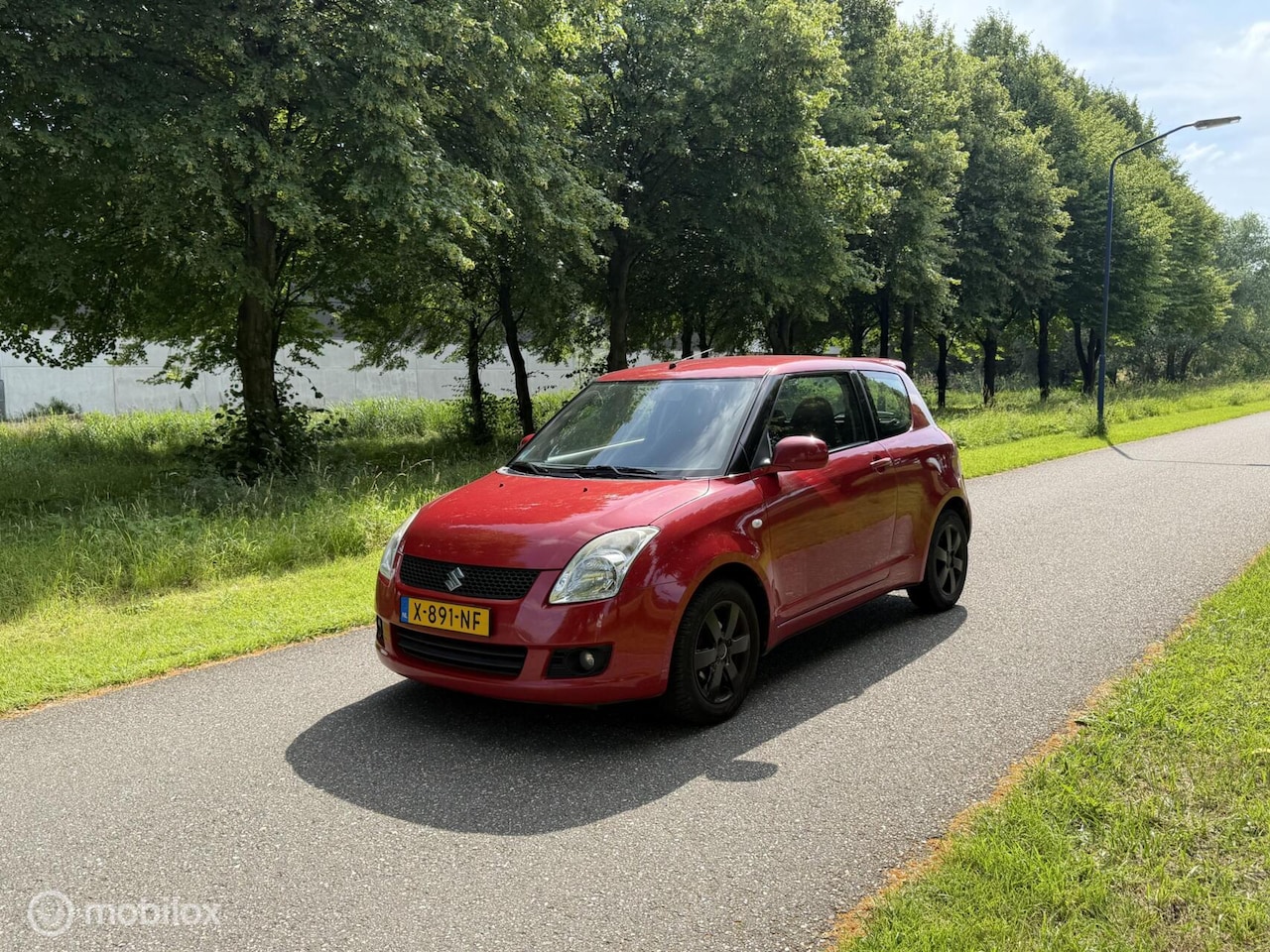 Suzuki Swift - 1.3 Base*APK 1/27*CLIMATE CONTROL*STOELVERWARMING - AutoWereld.nl