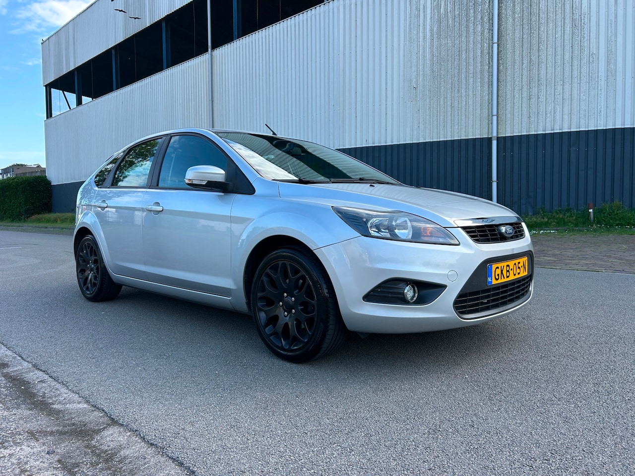 Ford Focus - 1.6 Titanium Xenon/Navi/Carplay/Airco/Cruise - AutoWereld.nl