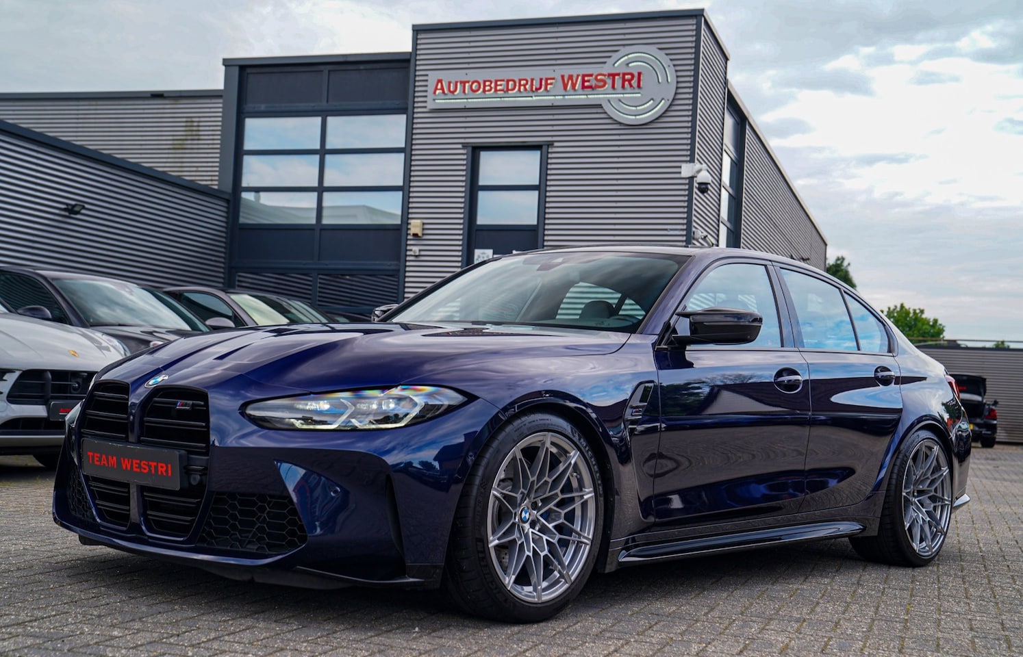BMW M3 - 3-serie Competition | Tansanitblau II metallic | Two Tone Leder | Kuipstoelen | 360 cam | - AutoWereld.nl