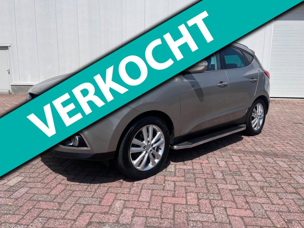 Hyundai ix35 - 2.0i i-Catcher automaat Panoramadak camera navigatie winterpakket 2011 - AutoWereld.nl