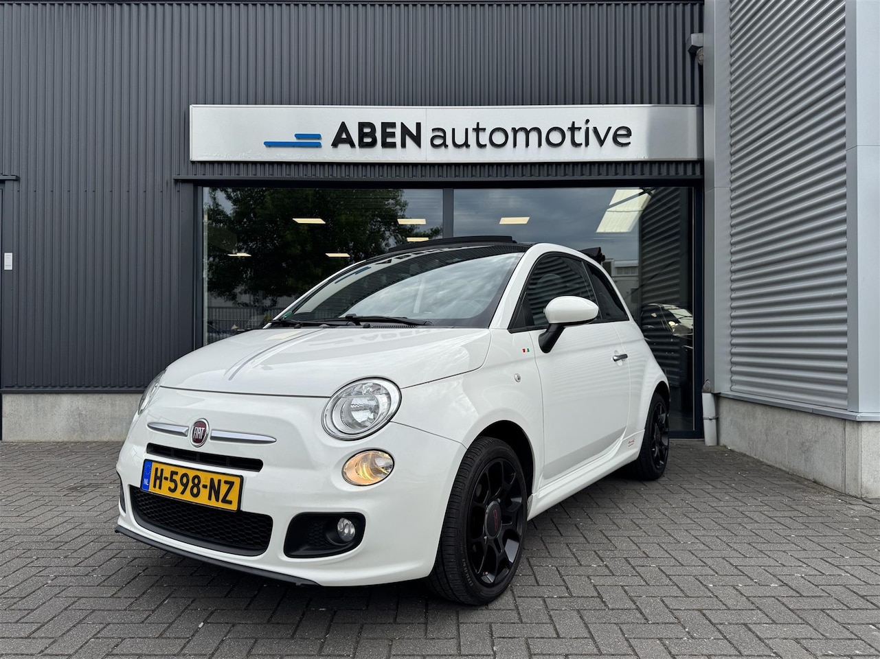 Fiat 500 C - 1.2 69PK Sport Edition Cabrio(16" LMV|PDC|NAVI|WINDSCHERM) - AutoWereld.nl