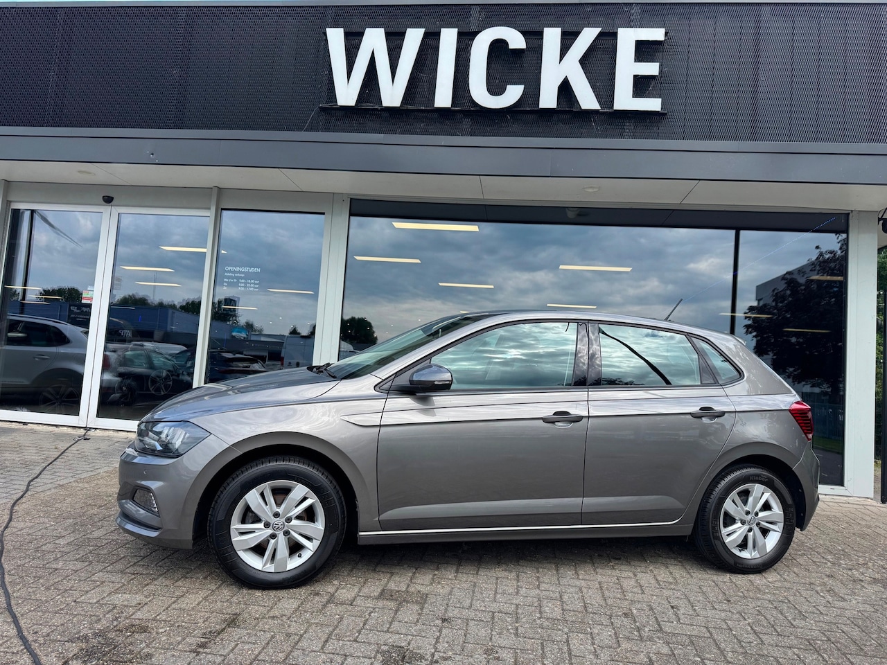 Volkswagen Polo - 1.0 TSI Comfortline Navigatie PDC PDC Clima - AutoWereld.nl