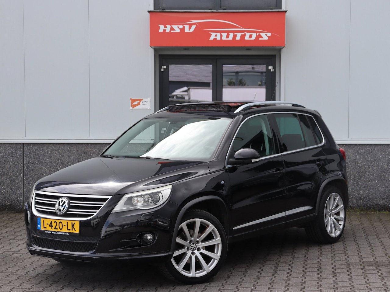 Volkswagen Tiguan - 2.0 TSI Comfort&Design 4Motion *NIEUWE KETTING* - AutoWereld.nl