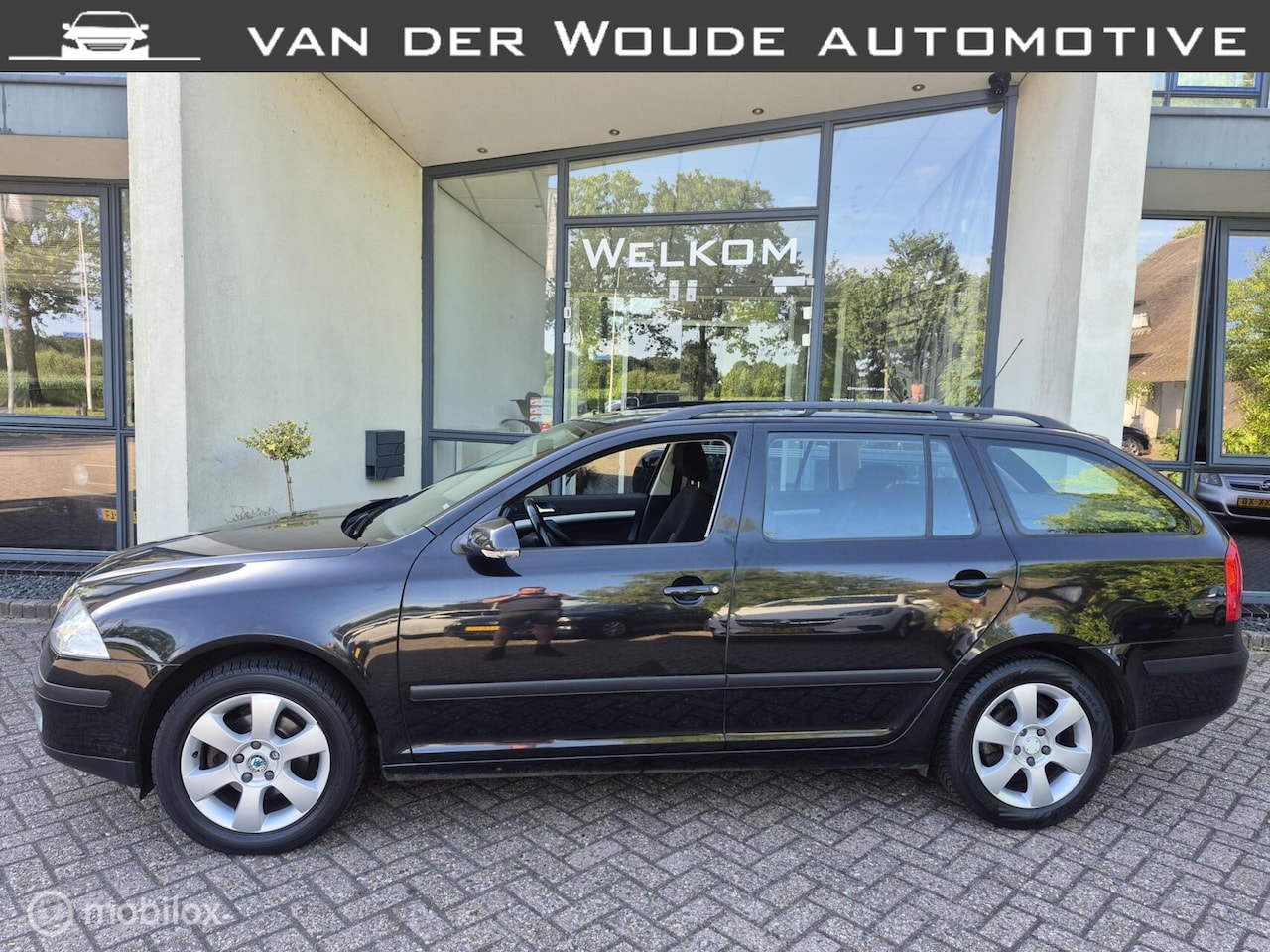 Skoda Octavia Combi - 1.6 FSI Ambiente '08|Airco|Cruise|T.Haak - AutoWereld.nl