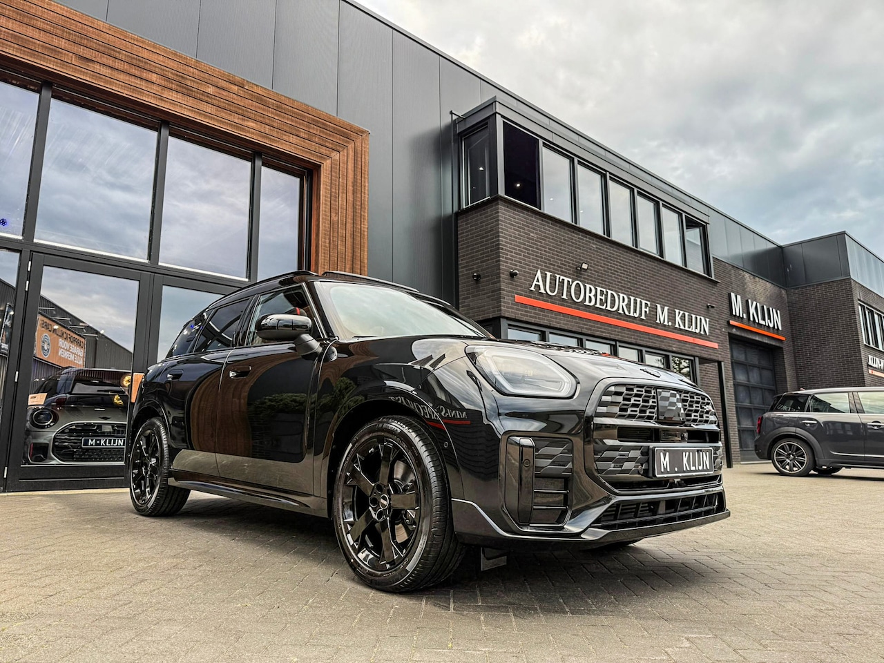 MINI Countryman - 1.5 C John Cooper Works XL 170pk/Trekhaak/Memory/Massage/Pano/Hk/Vol - AutoWereld.nl