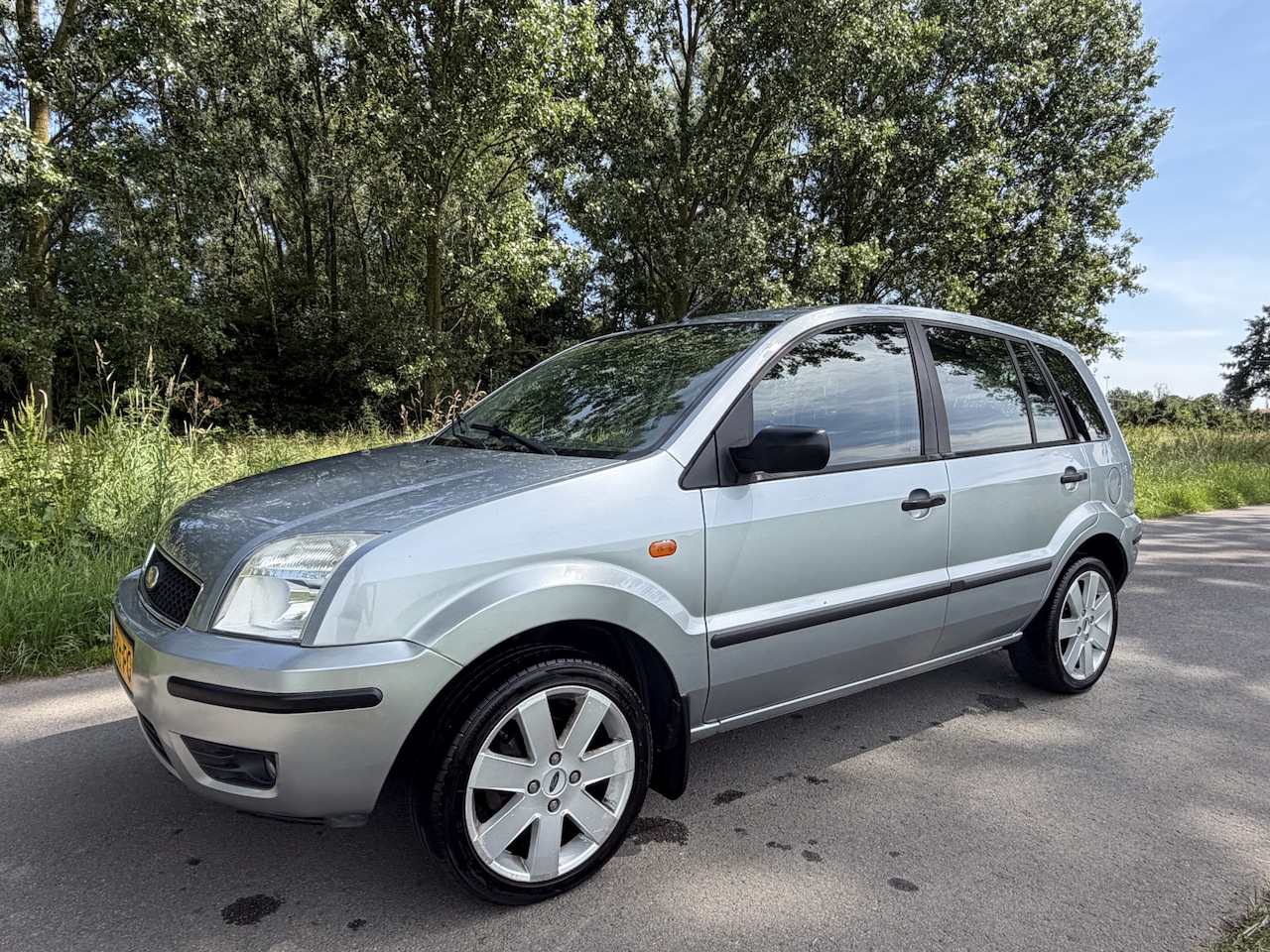 Ford Fusion - 1.4-16V Ghia 1.4-16V Ghia - AutoWereld.nl