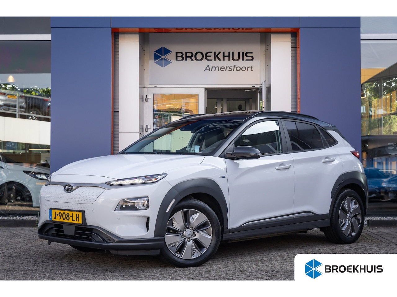 Hyundai Kona Electric - EV Premium 64 kWh | Memory | Schuifdak | Camera | Cruise adaptief | Head-up | Stoel ventil - AutoWereld.nl