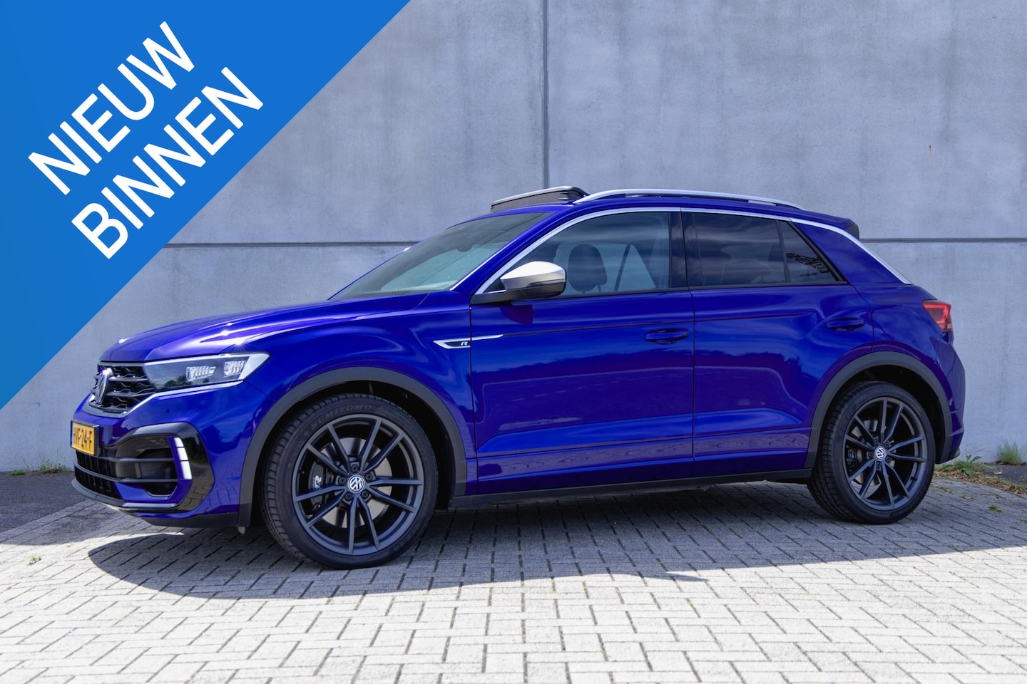 Volkswagen T-Roc - 2.0 TSI 4Motion R Pano l R-Line l Beats - AutoWereld.nl