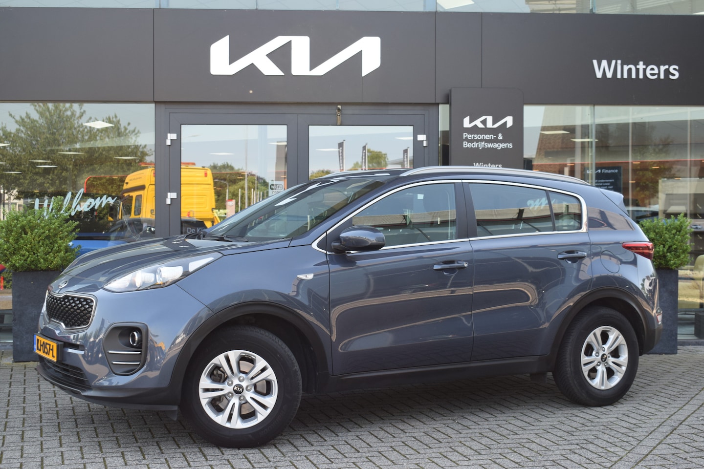 Kia Sportage - 1.6 GDI ComfortLine Navigator | Trekhaak | Navigatie | Climate + Cruise Control | Camera | - AutoWereld.nl