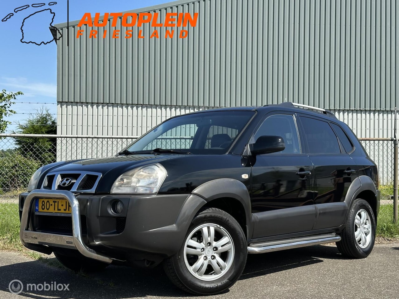Hyundai Tucson - 2.0i Style|Trekhaak|Leer|Clima|PDC|Cruise - AutoWereld.nl