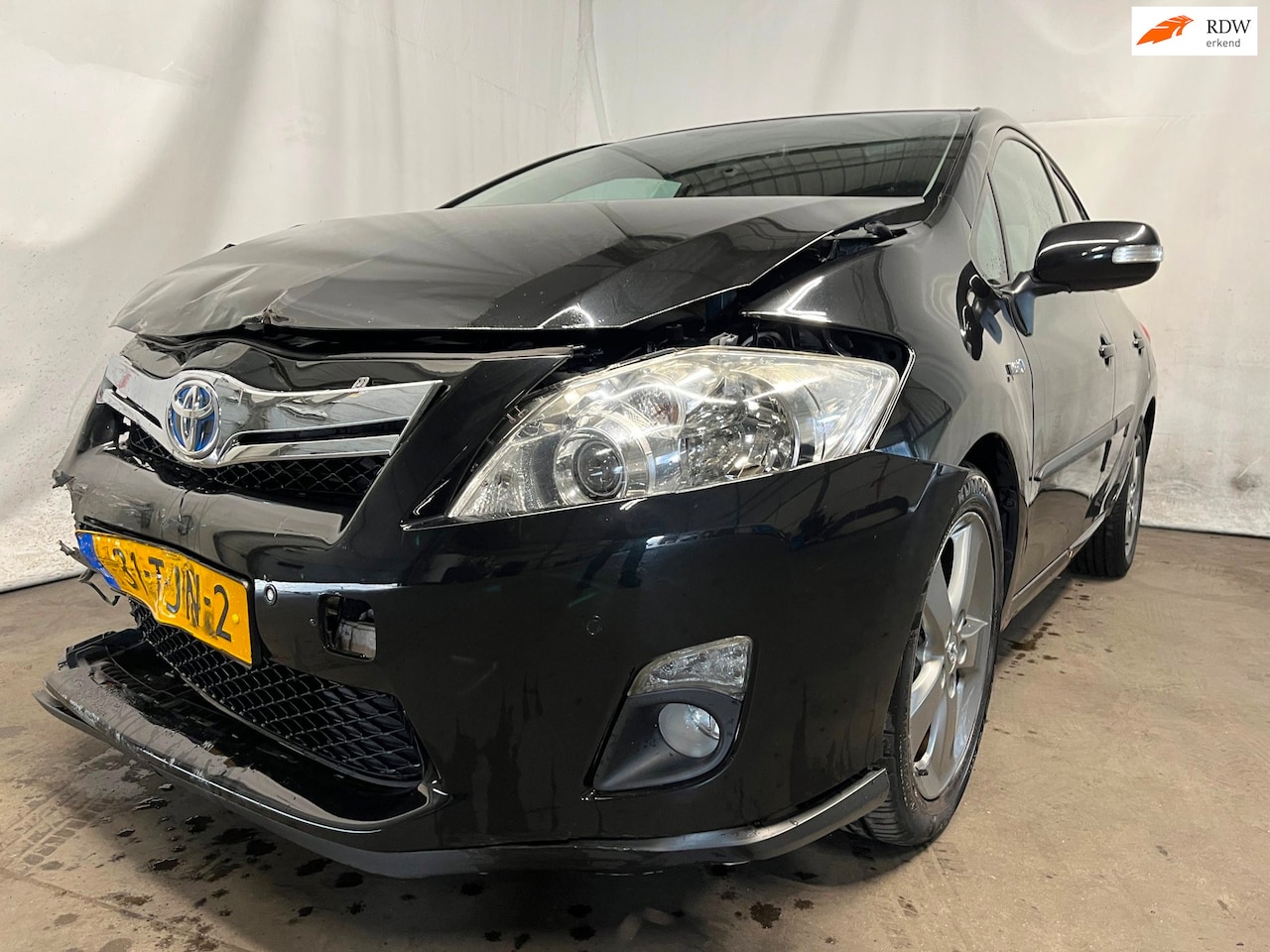 Toyota Auris - 1.8 Full Hybrid Executive Business - Schade - AutoWereld.nl