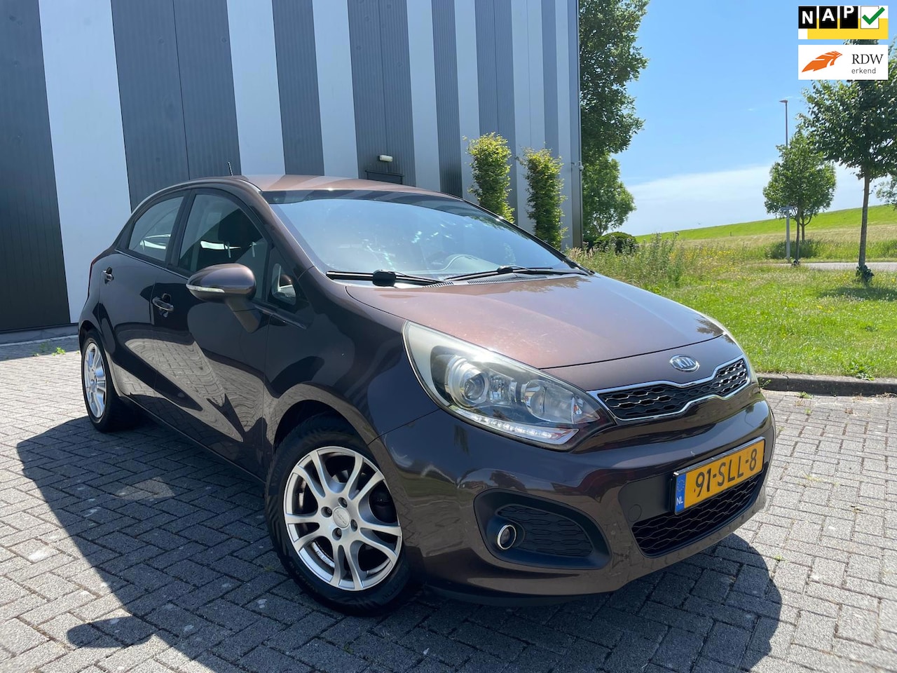 Kia Rio - 1.2 CVVT Super Pack Keyless-Airco-Cruise-Pdc-Lmv - AutoWereld.nl