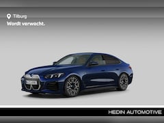 BMW i4 - eDrive40 84 kWh | Glazen schuif-/kanteldak | Driving Assistant Professional | Harman Kardo