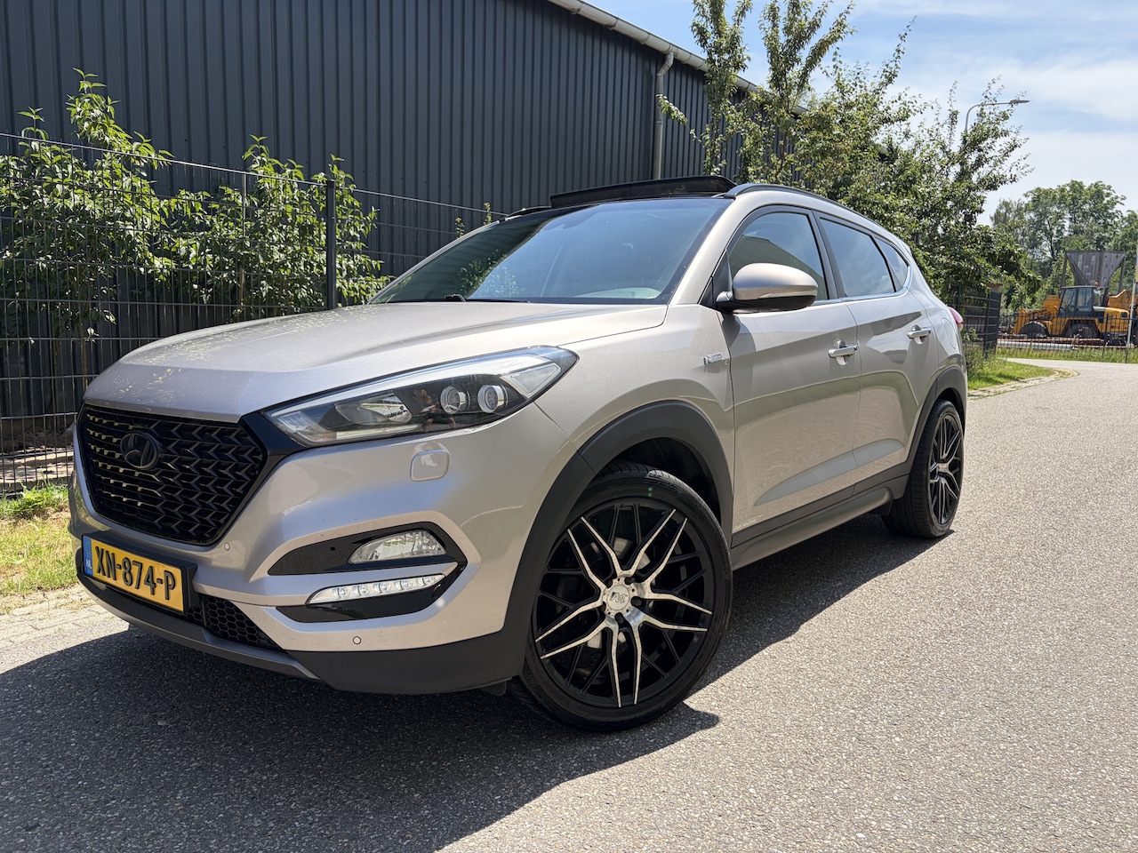 Hyundai Tucson - 1.6 T-GDi Premium / PANORAMADAK / LEER / NAVI / CRUISE / TREKHAAK / 140dkm! - AutoWereld.nl