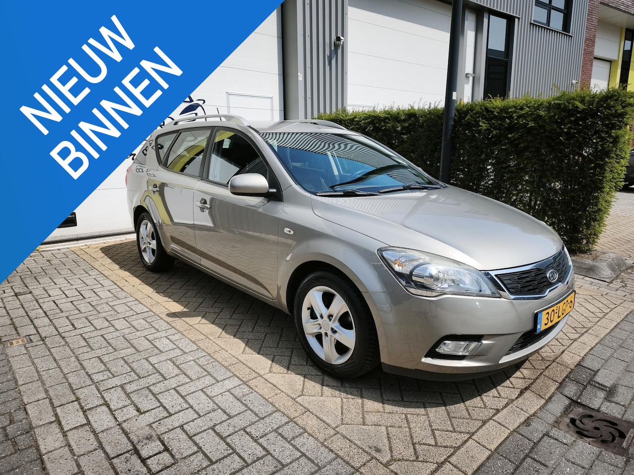Kia Cee'd - 1.4 CVVT X-ecutive 1.4 CVVT X-ecutive - AutoWereld.nl