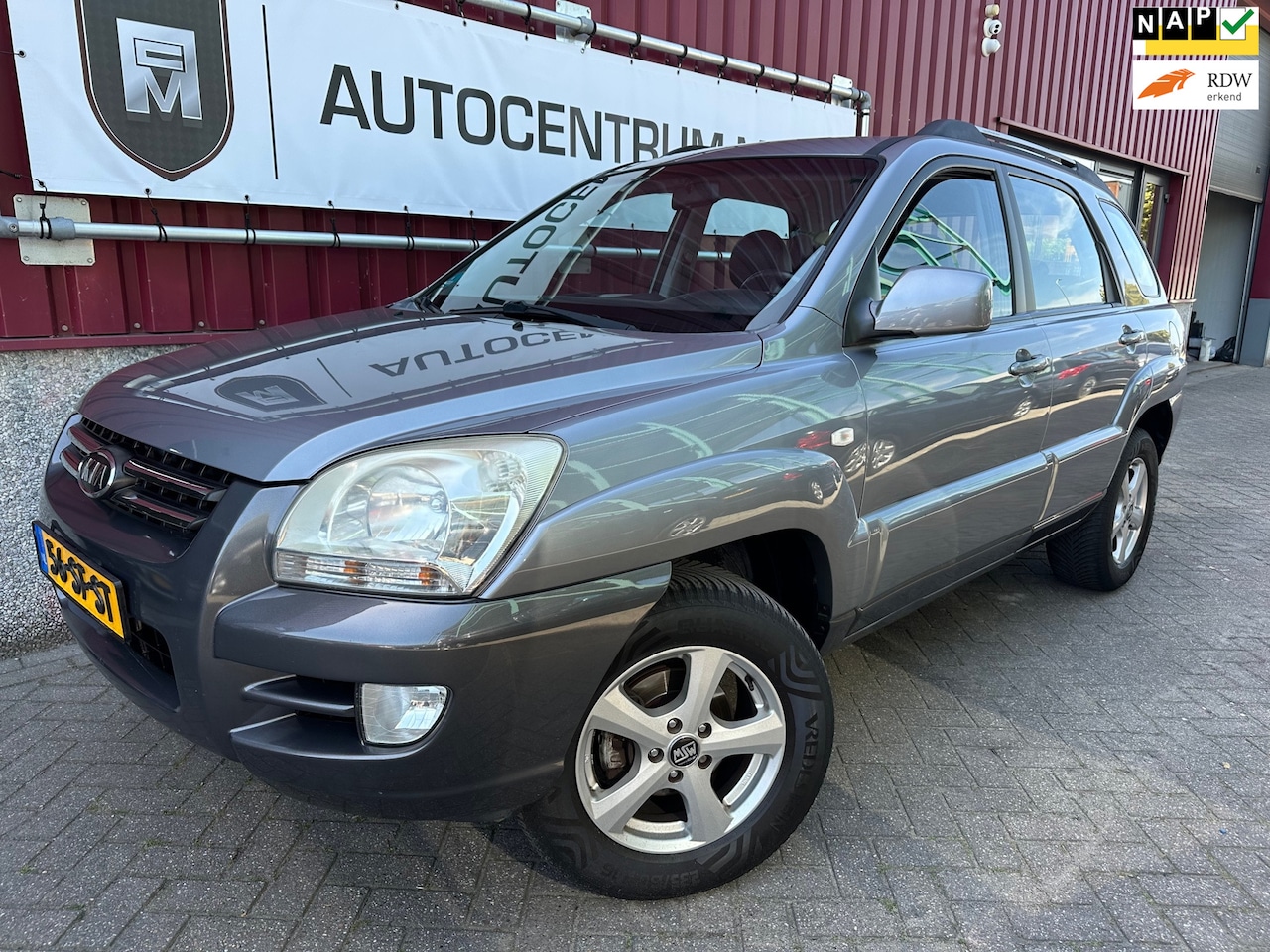 Kia Sportage - 2.0 CVVT Executive // Clima // 1/2 Leer // Trk.Hk // 174DKM NAP - AutoWereld.nl
