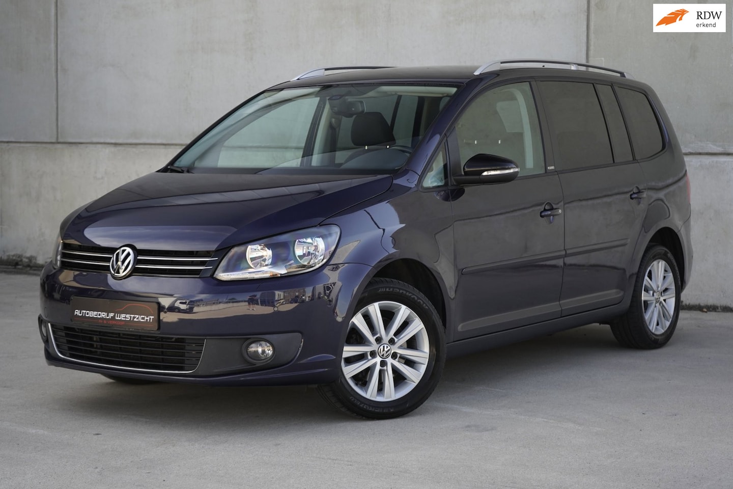 Volkswagen Touran - 1.2 TSI Style 7p. Airco, Cruise, Stoelverwarming - AutoWereld.nl