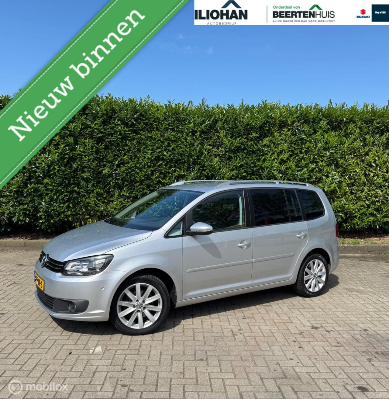 Volkswagen Touran - 1.4 TSI Highline 1.4 TSI Highline - AutoWereld.nl