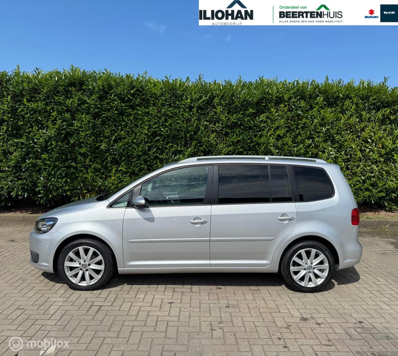 Volkswagen Touran - 1.4 TSI Highline 1.4 TSI Highline - AutoWereld.nl