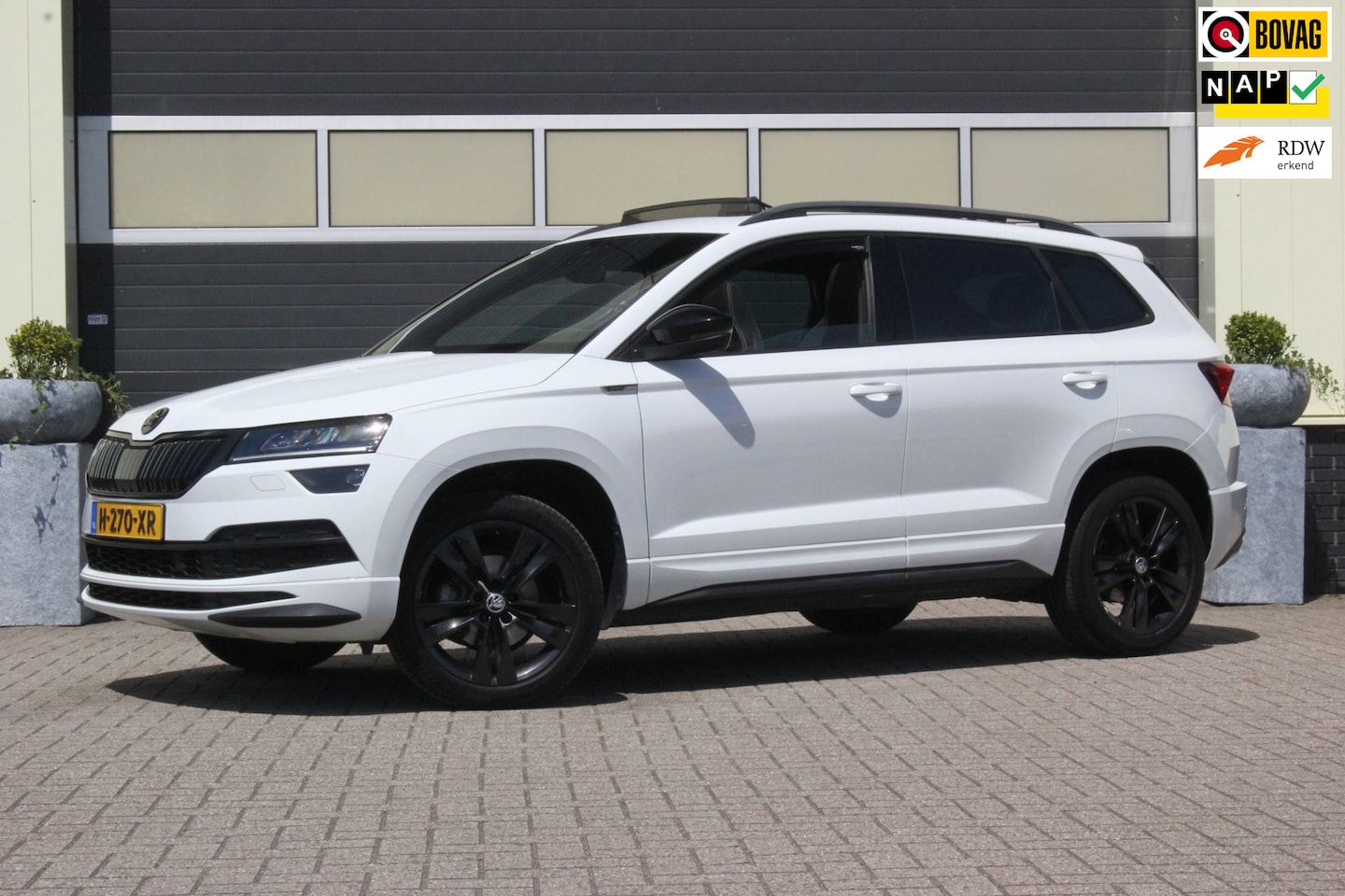 Skoda Karoq - 1.5 TSI ACT Sportline Business | Panoramadak | - AutoWereld.nl