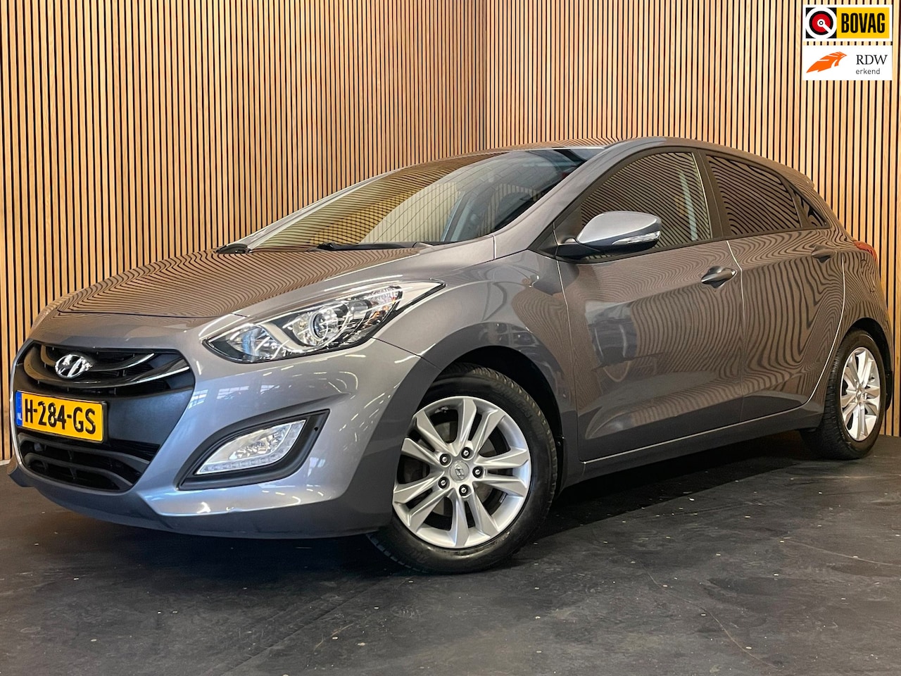 Hyundai i30 - 1.6 GDI|135 PK|CLIMATE+CRUISE CONTROL|ELEK.RAMEN+SPIEGELS|BLUETOOTH|RADIO/CD|GETINTE RAMEN - AutoWereld.nl