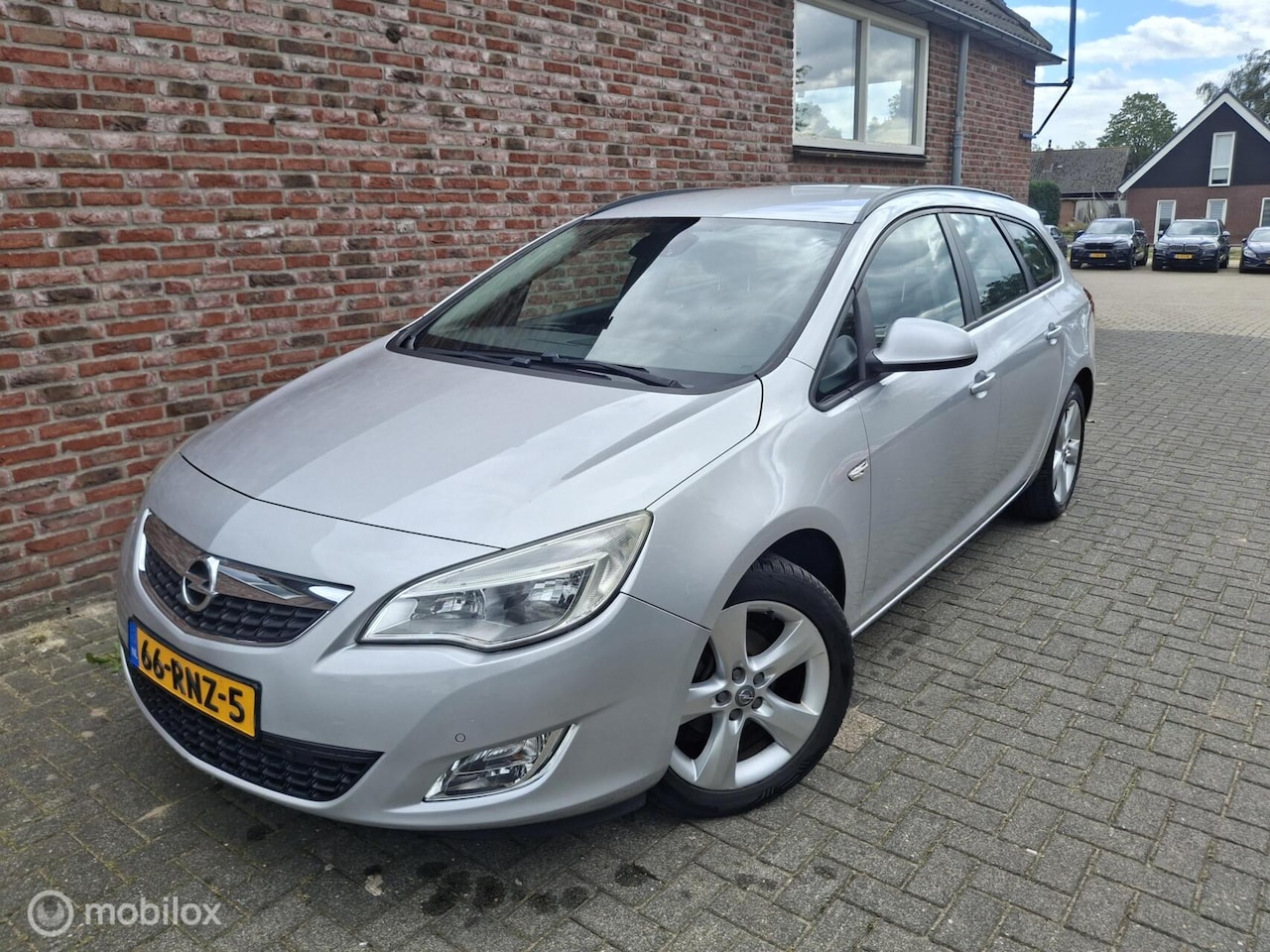 Opel Astra Sports Tourer - 1.4 Turbo Sport 1.4 Turbo Sport - AutoWereld.nl