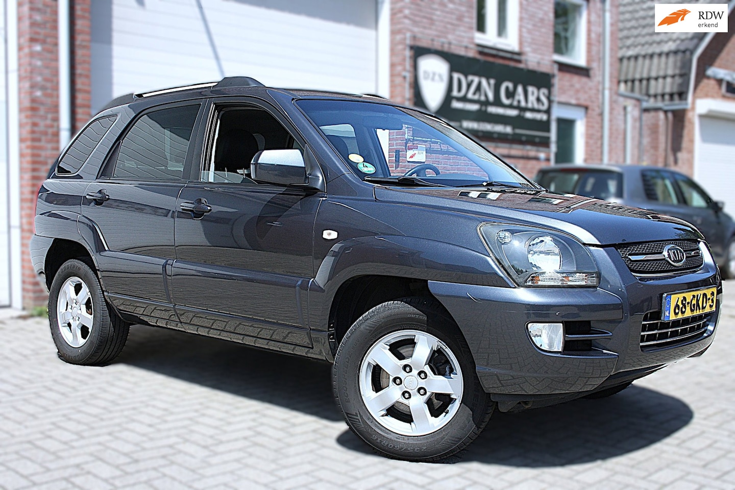 Kia Sportage - 2.0 CVVT X-tra |Nap|Leer|Airco|Trekhaak|Cruise control - AutoWereld.nl
