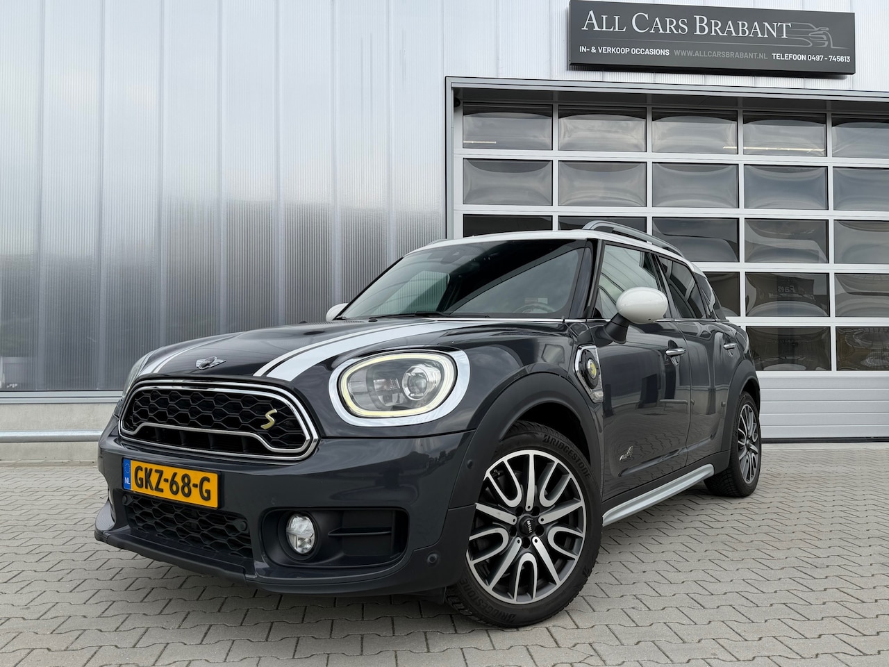 MINI Countryman - 1.5 Cooper S E ALL4 Pepper / leder / xenon / navi - AutoWereld.nl