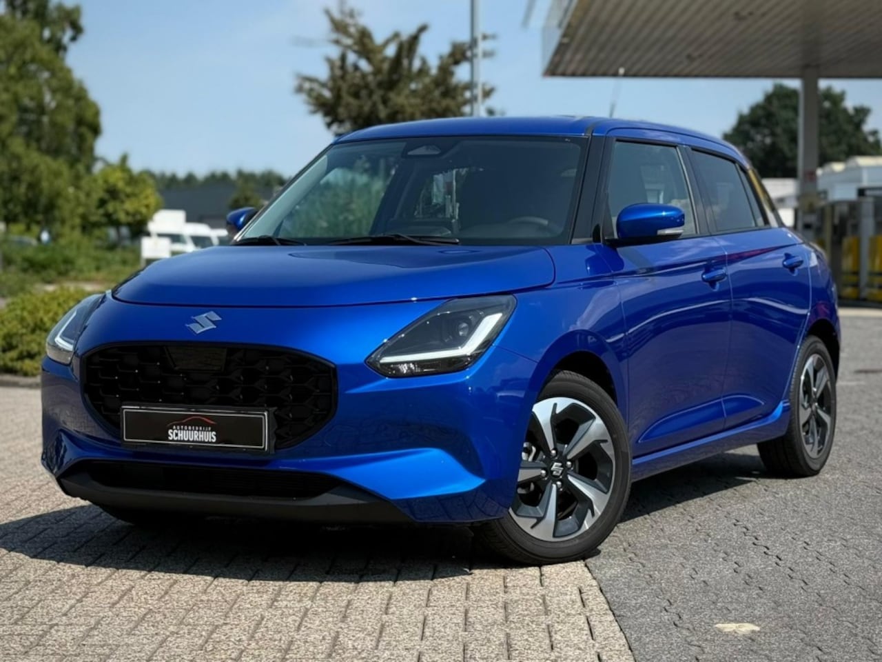 Suzuki Swift - 1.2 STYLE AUTOMAAT SMART HYBR. KEYLESS ECC CAMERA NAVI ADD. CRUISE - AutoWereld.nl