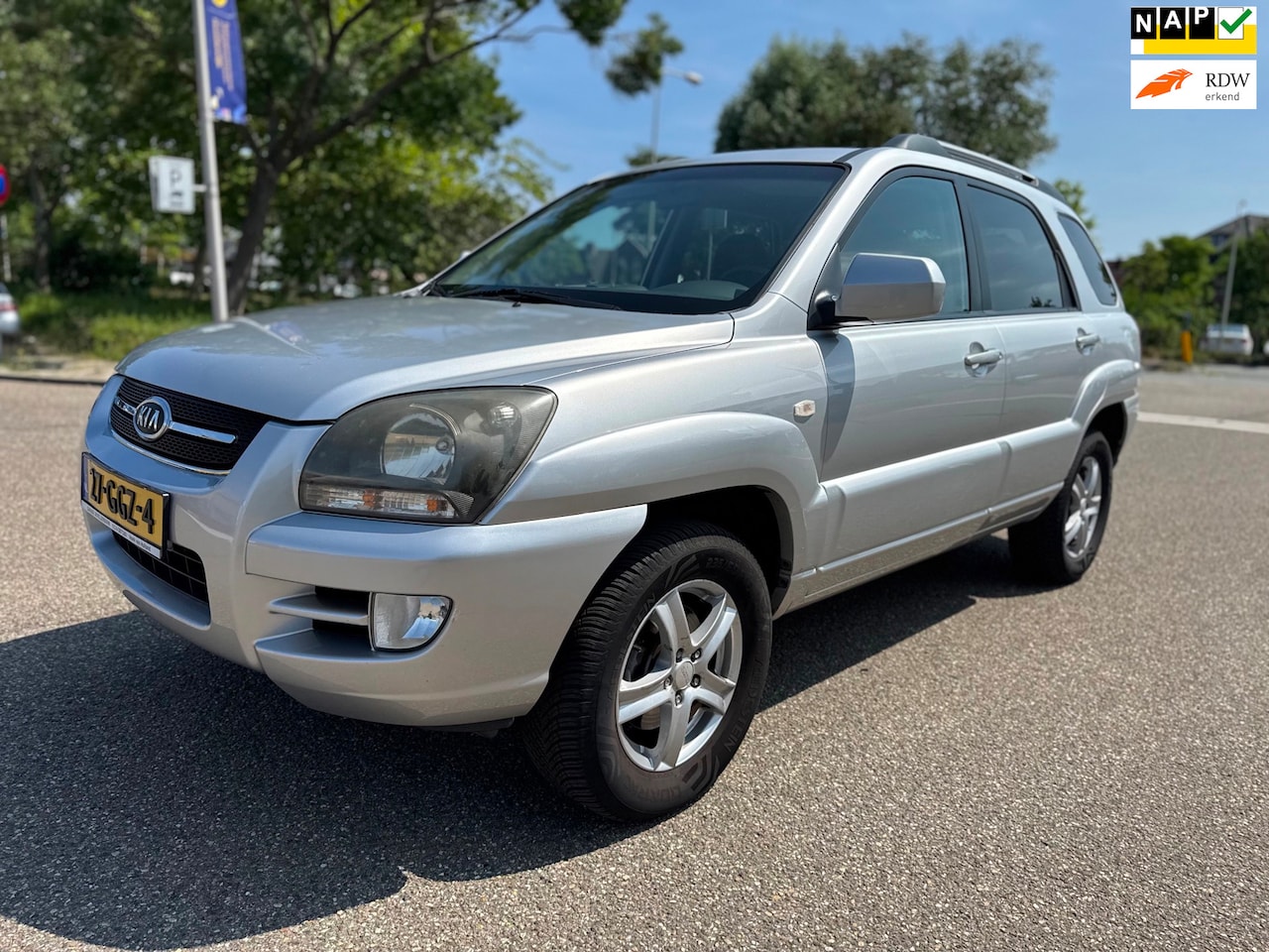 Kia Sportage - 2.0 CVVT Comfort / airco / cruise.control / elek.ramen / deurvergrendeling / lmv / trekhaa - AutoWereld.nl