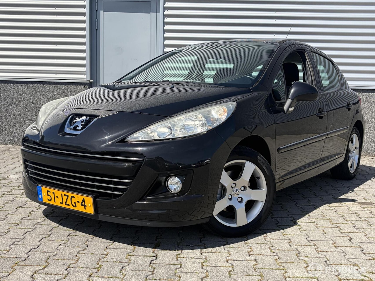 Peugeot 207 - 1.6 VTi Première Airco,Cruise,Navi,Trekhaak - AutoWereld.nl
