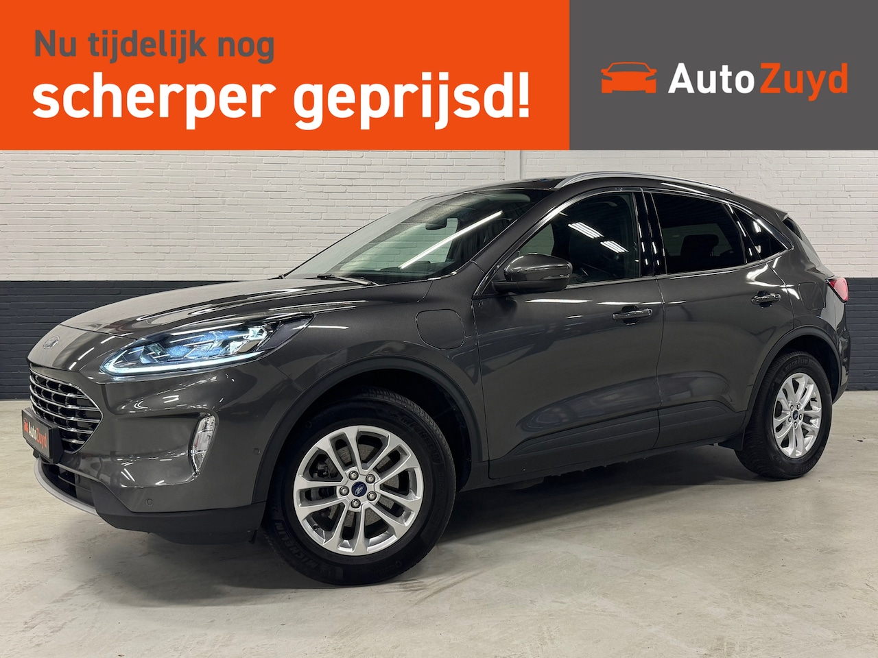 Ford Kuga - 2.5 PHEV Titanium / Navi / Camera / DAB / Elektrische stoel / Climate Control - AutoWereld.nl
