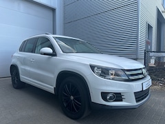 Volkswagen Tiguan - 2.0 TSI 4Motion |Dsg|Leer|Cruise|Stoelvw|2xpdc|Navi|200pk