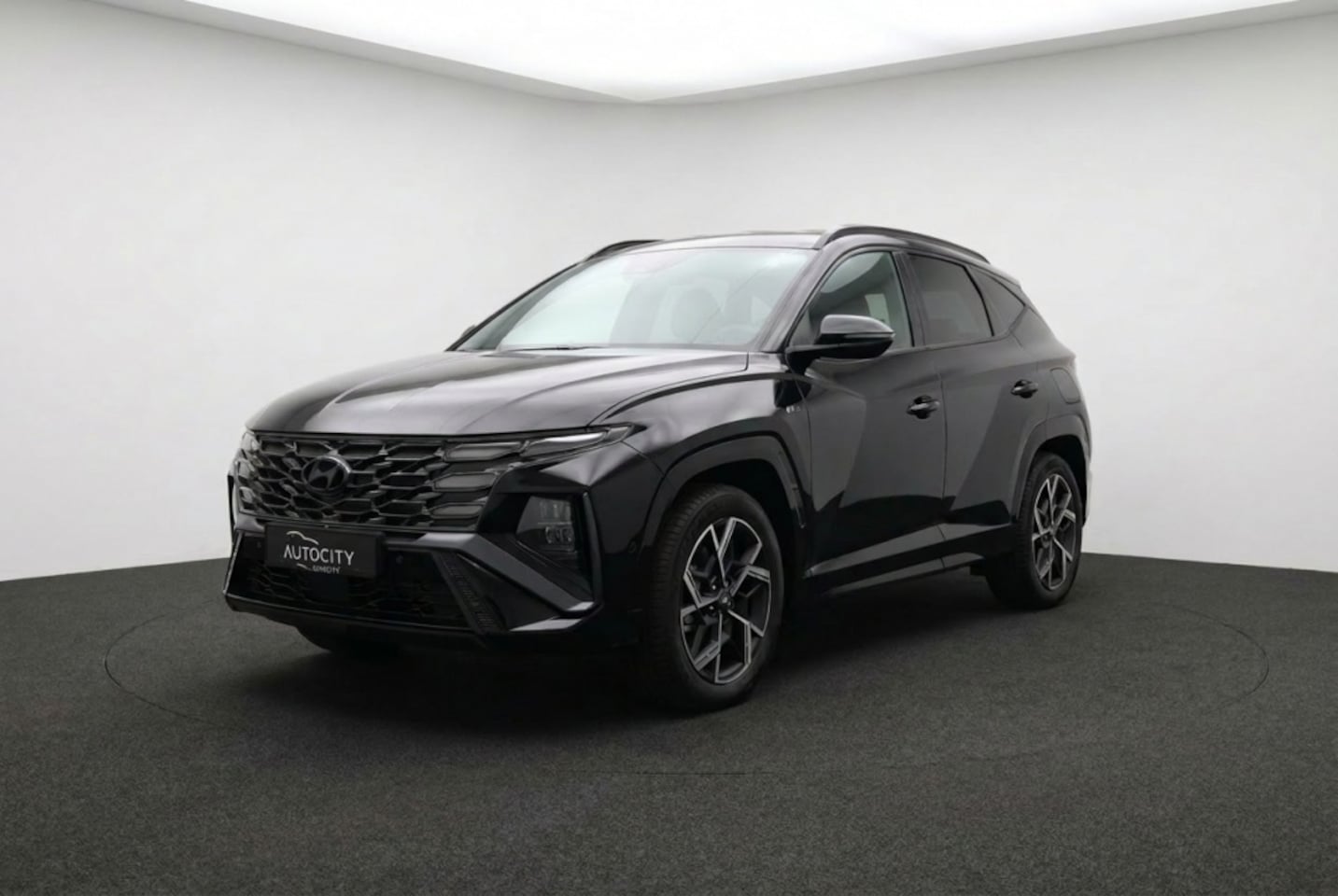 Hyundai Tucson - 1.6 T-GDI N Line Sky 4WD 285pk l Pano l Camera l NIEUW! - AutoWereld.nl