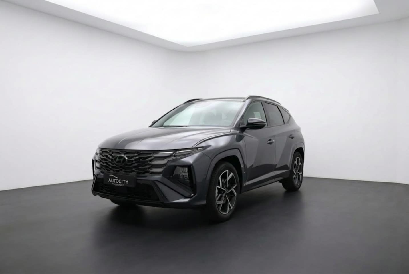 Hyundai Tucson - 1.6 T-GDI N Line Sky 4WD 285pk l Pano l Camera l NIEUW! - AutoWereld.nl