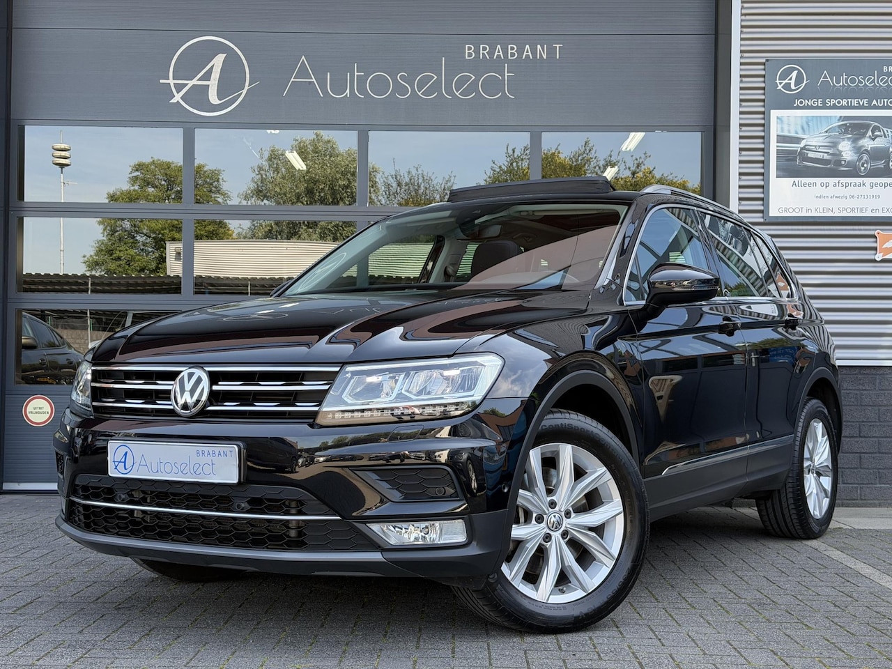 Volkswagen Tiguan - 2.0 TSI 4Motion Highline Pano | Cam | Dealer OH - AutoWereld.nl