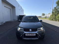 Suzuki Grand Vitara - 2.0-16V High Executive - 4X4/LEER/NAP