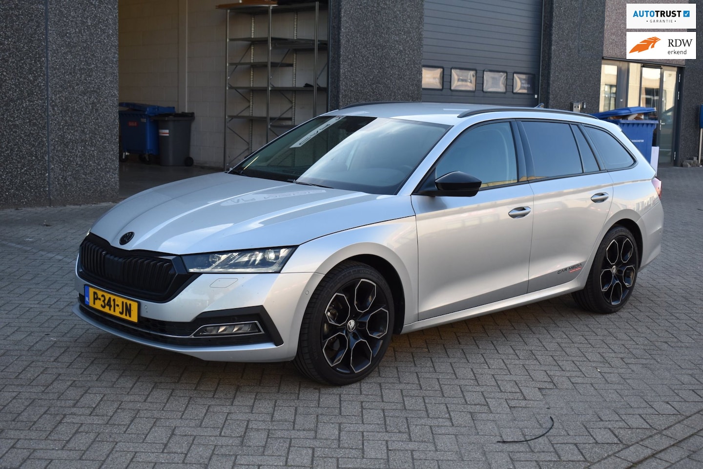 Skoda Octavia Combi - 2.0 TDI Sportline, Airco, Ecc, Cruise, Navi, Camera. - AutoWereld.nl