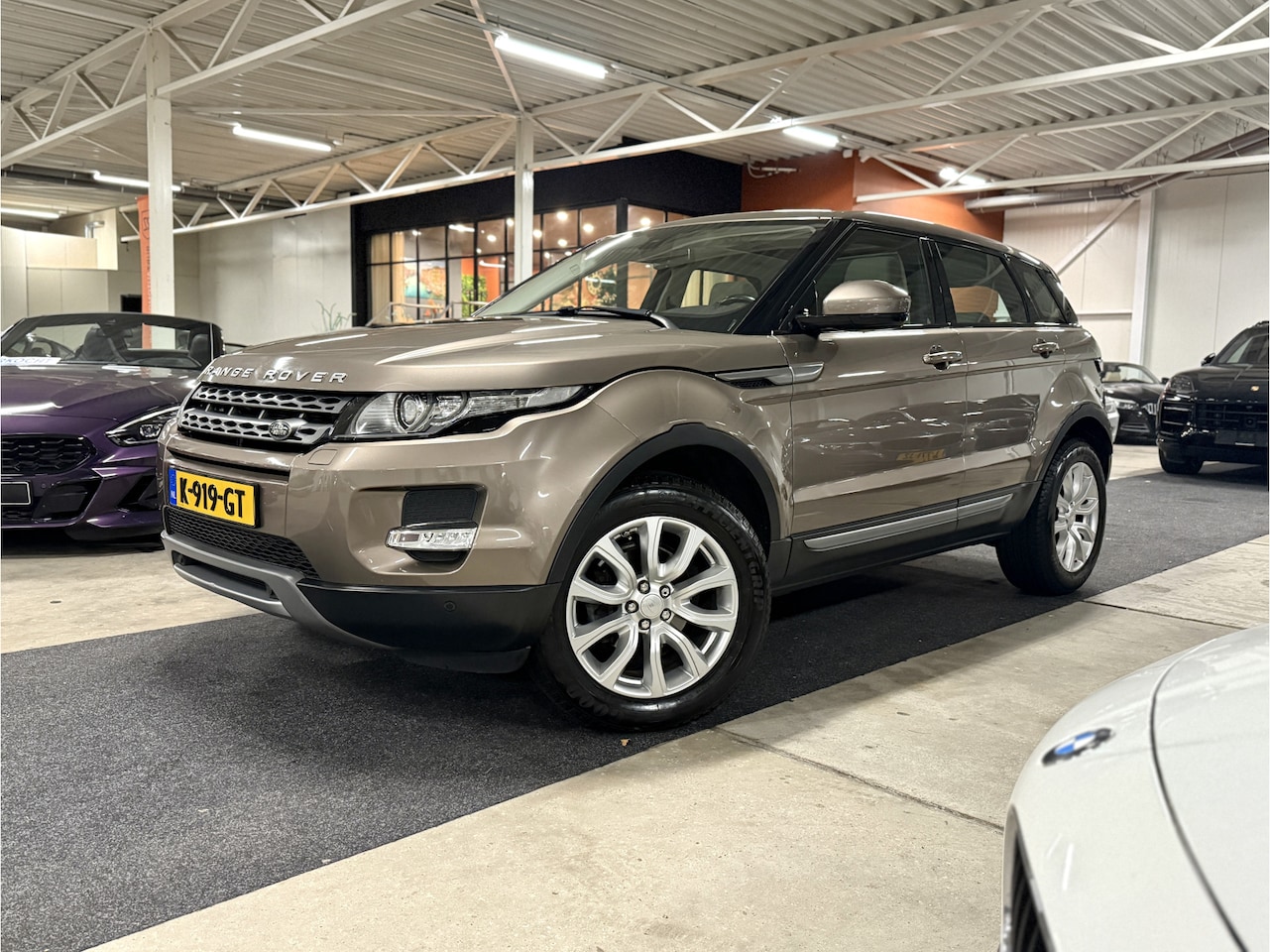 Land Rover Range Rover Evoque - 2.0 Si 4WD Prestige l Pano l Leder l Meridian l Camera - AutoWereld.nl