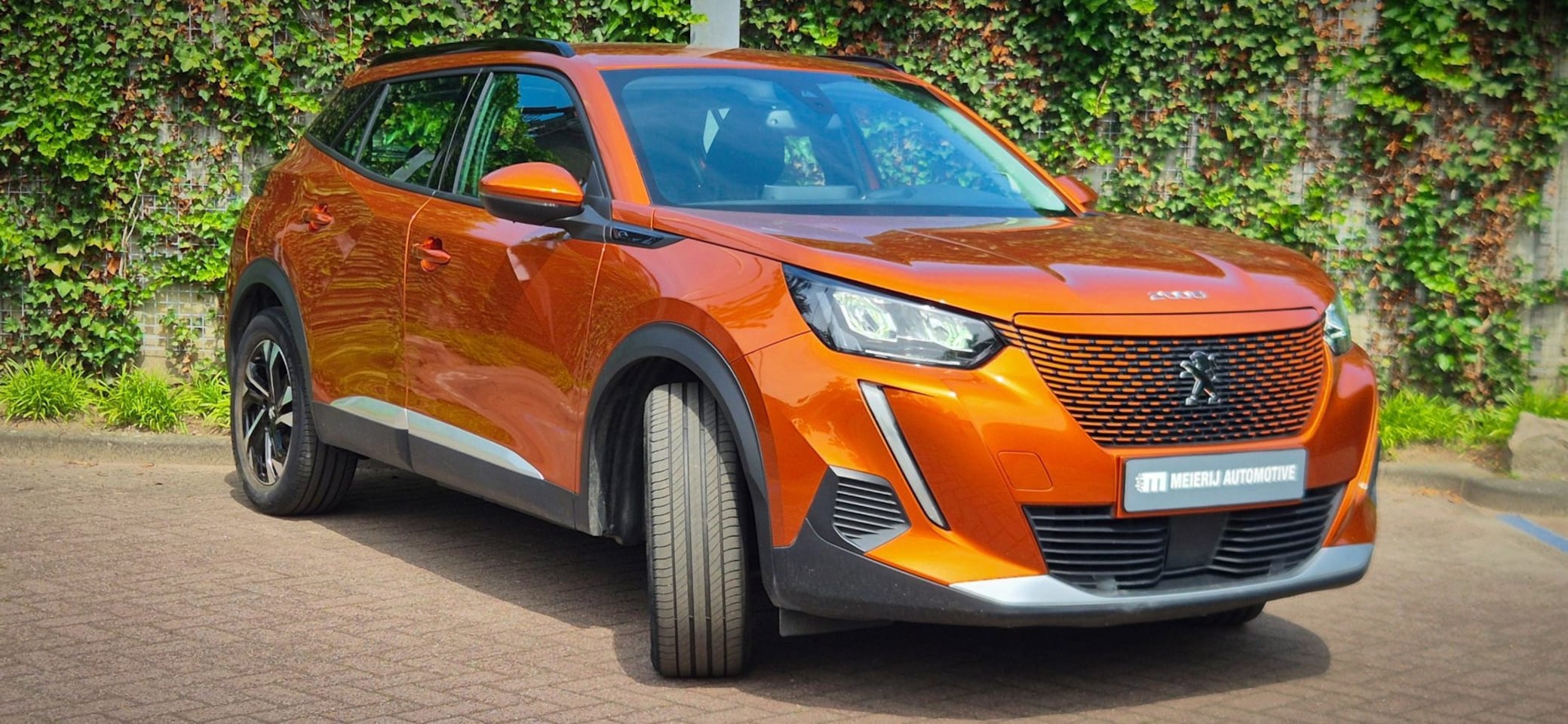 Peugeot e-2008 - EV Allure Première 1 fase 50 kWh | Nappa Leder | Stoelverwarming | Camera | Warmtepomp | O - AutoWereld.nl