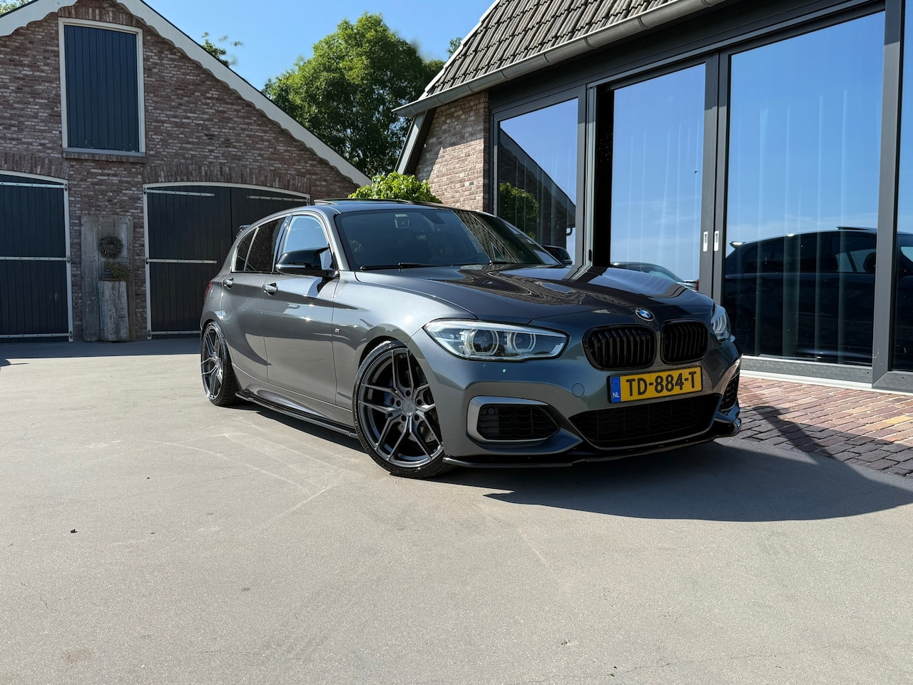 BMW 1-serie - M140i xDrive Full optie - AutoWereld.nl