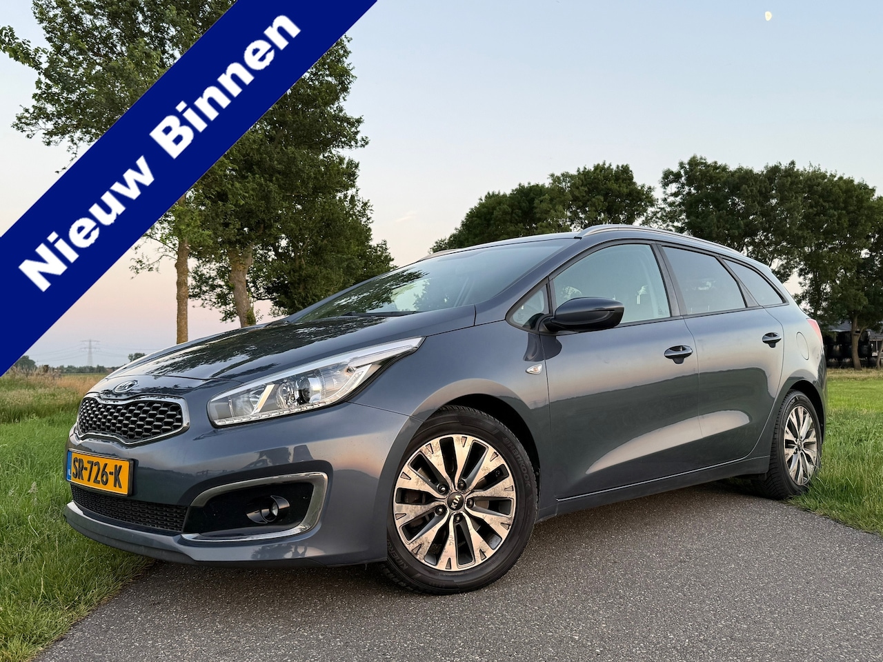 Kia Cee'd Sportswagon - 1.0 T-GDi Design Edition | Camera | Apple CarPlay & Android Auto | Trekhaak | Clima | Navi - AutoWereld.nl