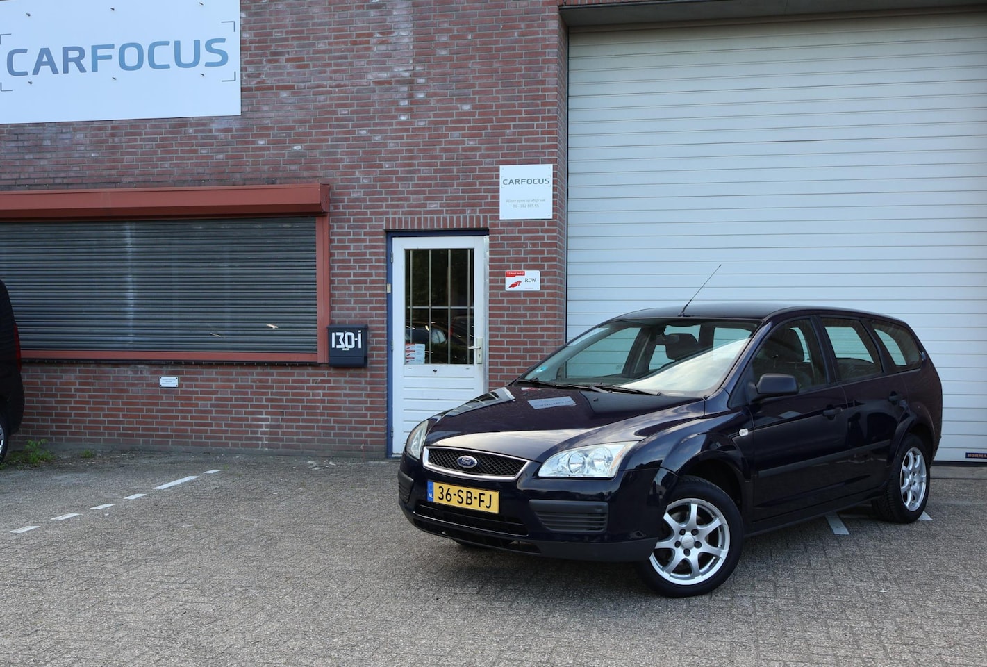 Ford Focus Wagon - 1.6-16V Champion NAP Cruise Airco Carplay APK - AutoWereld.nl