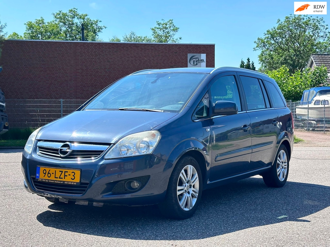 Opel Zafira - 1.8 Cosmo Automaat*Cruise*Trekhaak*Clima*LM vlgen*Half leder* - AutoWereld.nl
