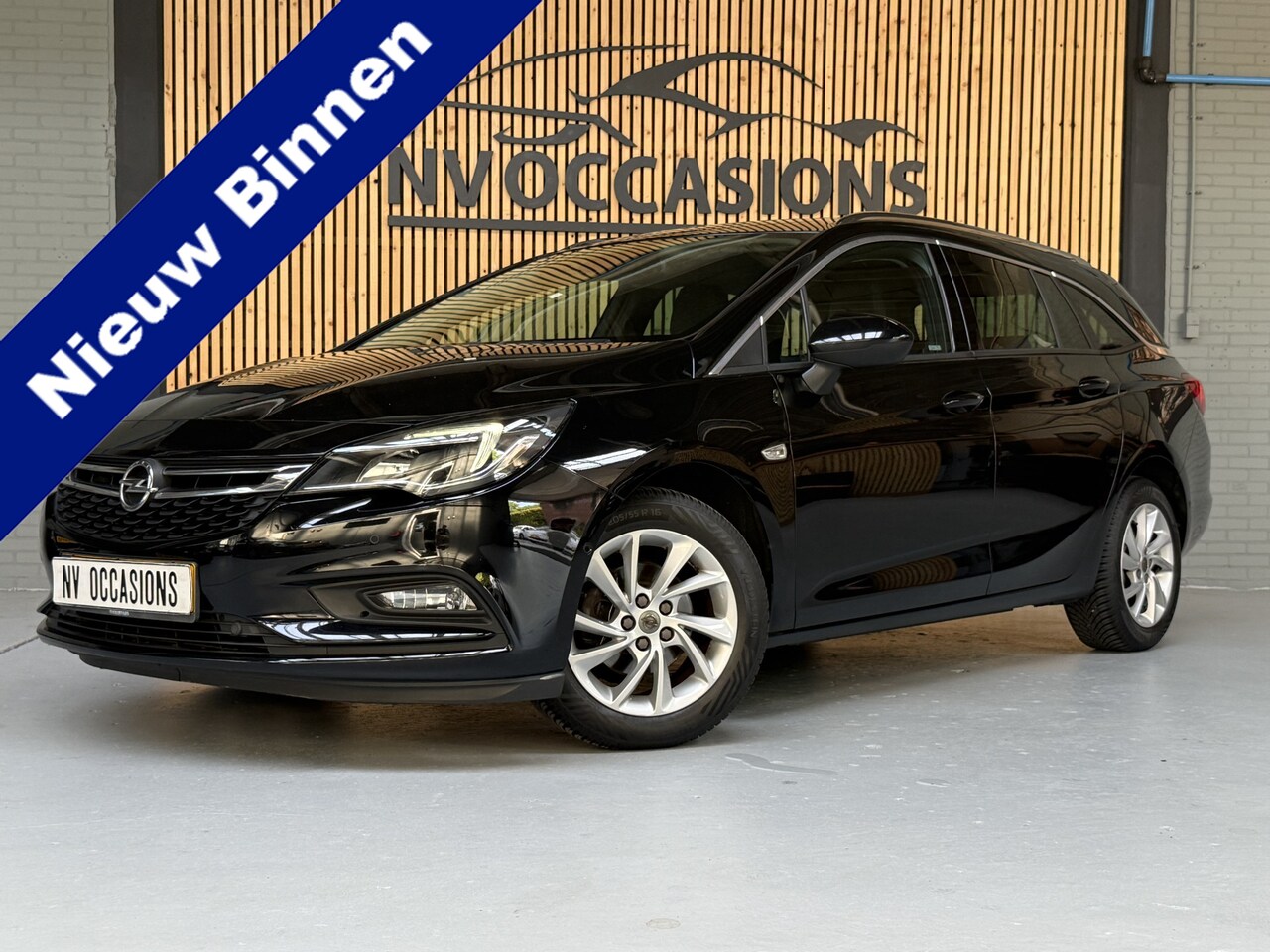 Opel Astra Sports Tourer - 1.4 Innovation 1E EIGNR/DEALEROH/AUTOMAAT/CAMERA/CRUISE/NAP! - AutoWereld.nl