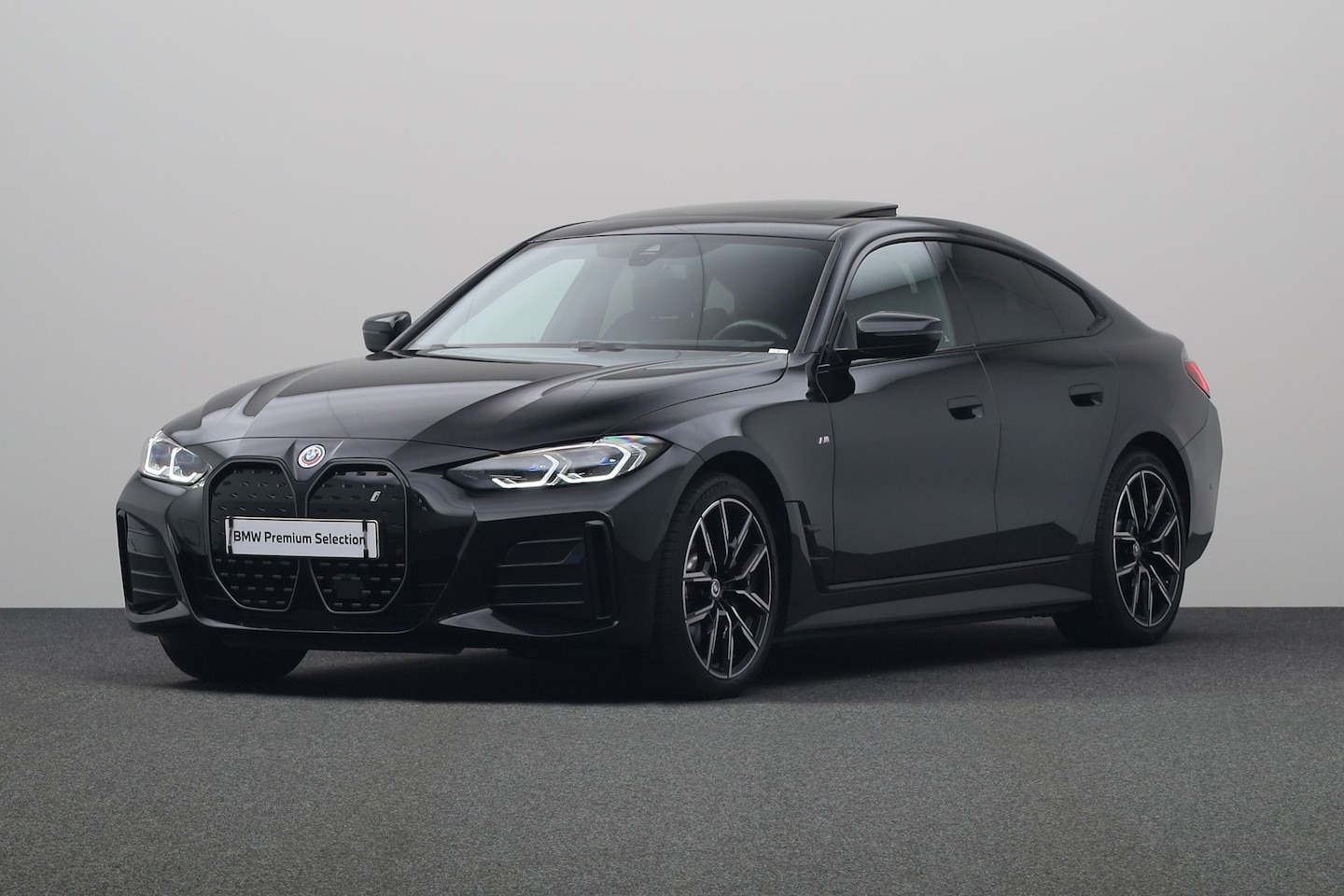 BMW i4 - eDrive40 High Executive 84 kWh | Harman Kardon | Stuurwielrand verwarmd | Glazen schuif-/k - AutoWereld.nl
