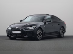 BMW i4 - eDrive40 High Executive 84 kWh | Harman Kardon | Stuurwielrand verwarmd | Glazen schuif-/k